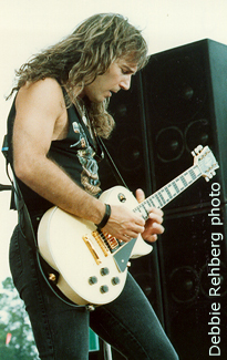 Dave playing white Les Paul